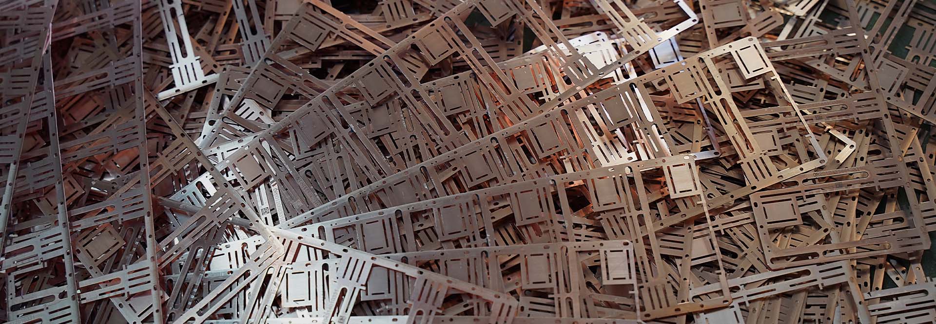 Gray pieces of metal, which are manufacturing waste for recycling, (photo)